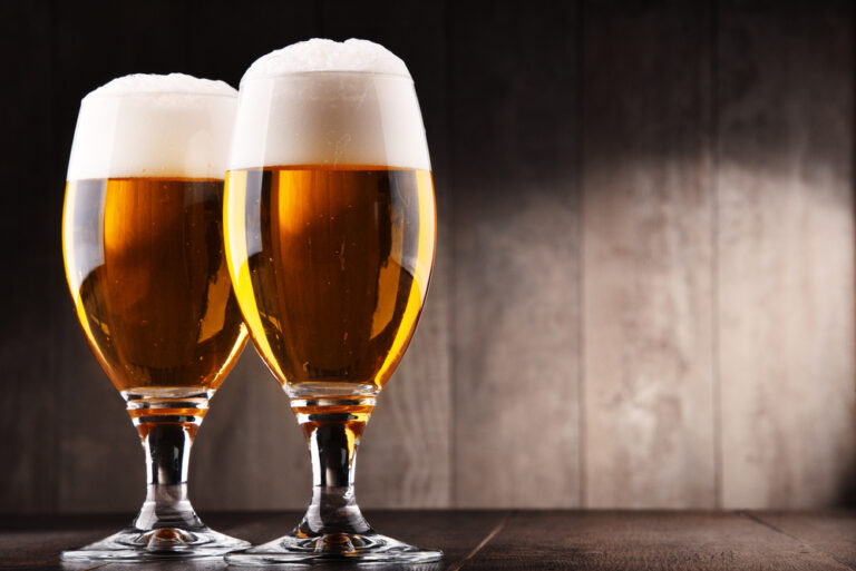Composition with two glasses of lager beer – Beer Business Finance