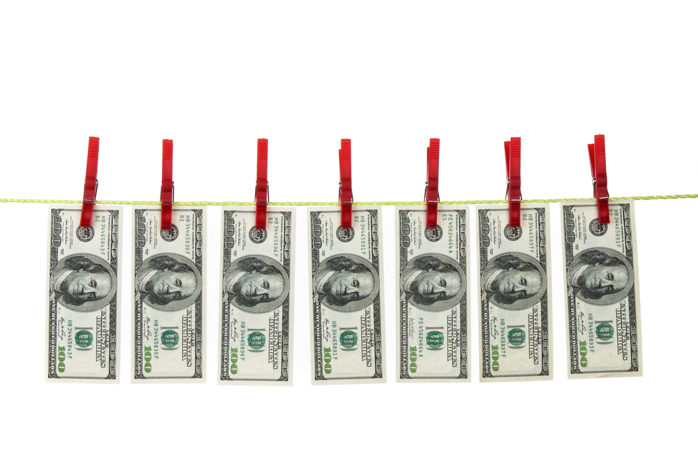 money-laundering-with-dollars-on-Depositphotos_8167027_S